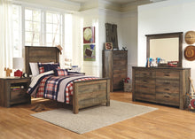 Trinell Panel Bed