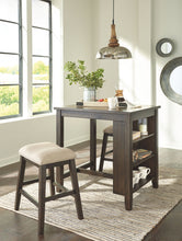 Rokane Counter Height Dining Room Table and Bar Stools (Set of 3)