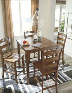 Hazelteen Counter Height Dining Room Table and Bar Stools (Set of 5)